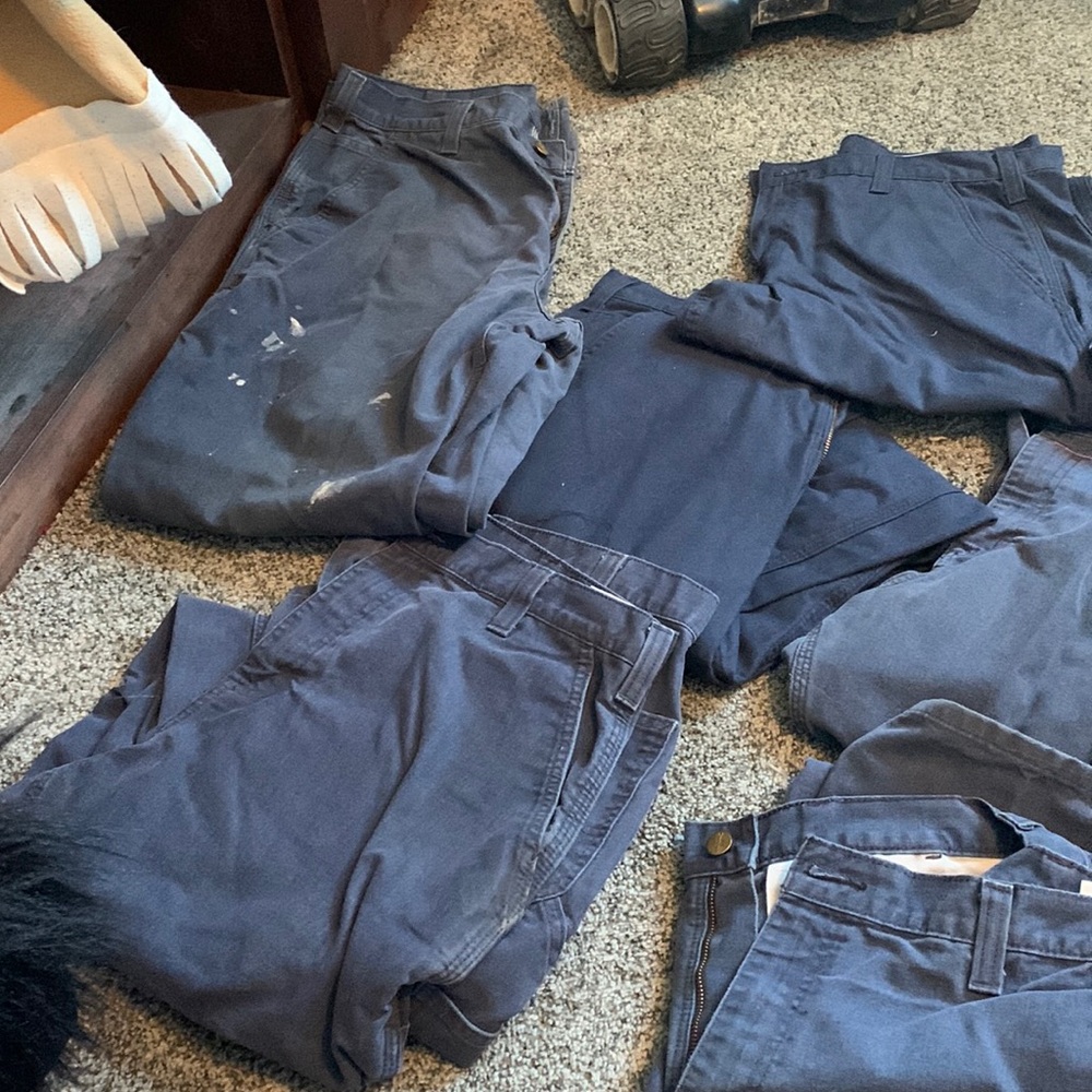 9 pairs of mens carhartt work pants